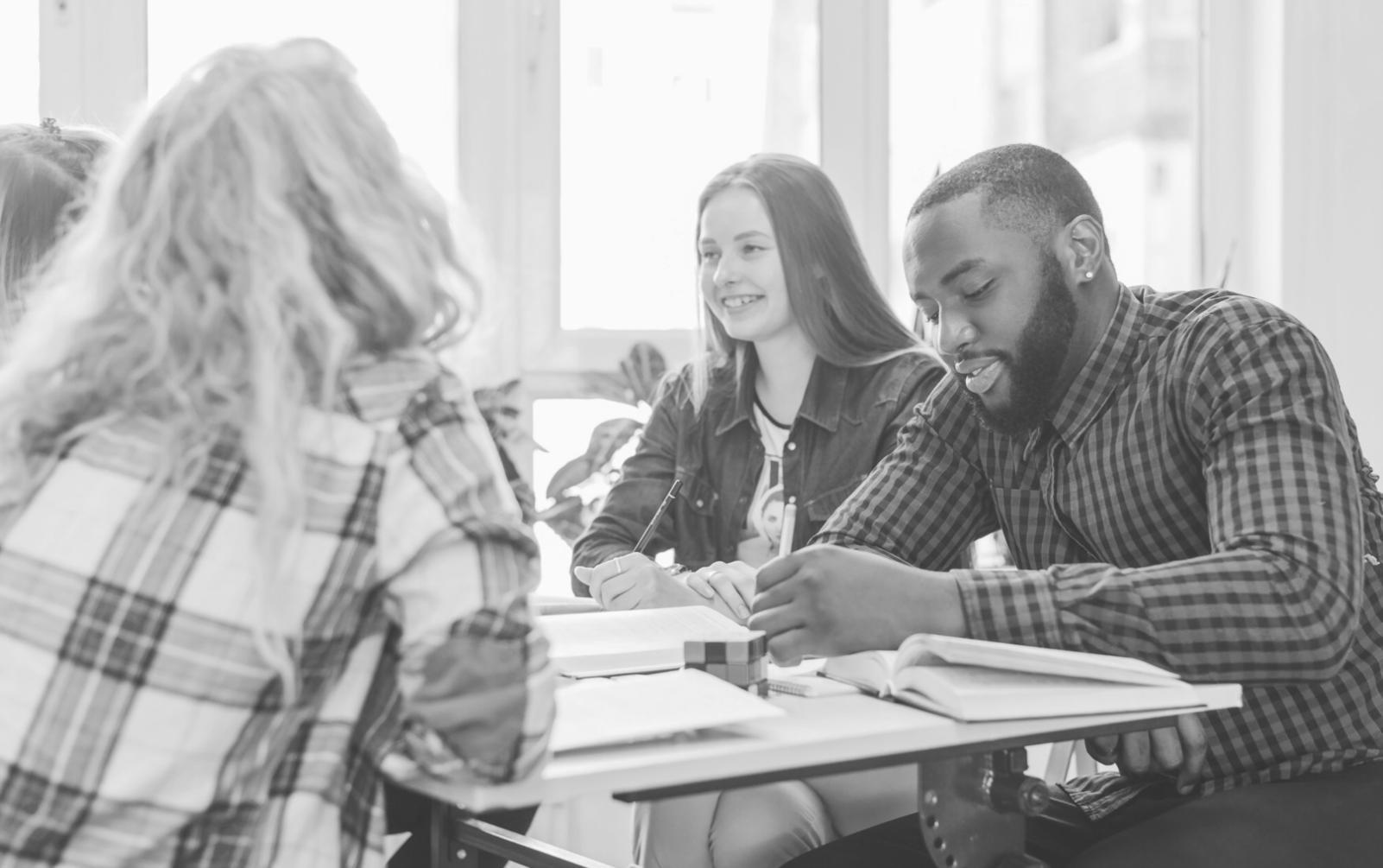 Group of professionals collaborating on financial analysis project